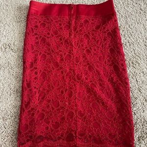I’m selling you this cute lace skirt!